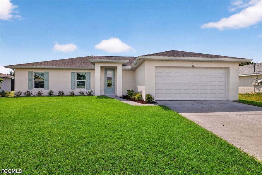 Front exterior of a new home in Cape Coral, Cape Coral, FL, highlighting curb appeal (Image 1). Front exterior of a new home in Cape Coral, Cape Coral, FL, highlighting curb appeal (Image 1).