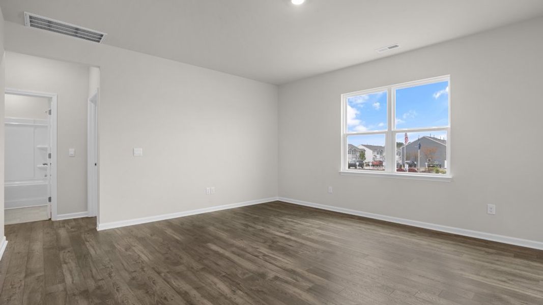 Spacious, unfurnished interior of a new home in The Reserve at Prestleigh, Wake Forest (Image 12).
