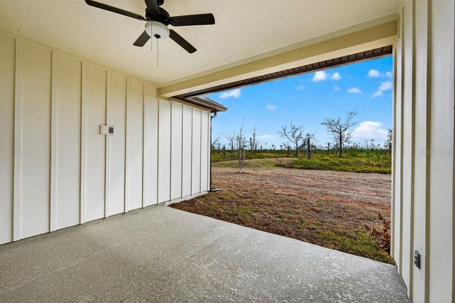 Exterior details and patio area of a home in Stables at Cary Forest, Bryceville (Image 3).