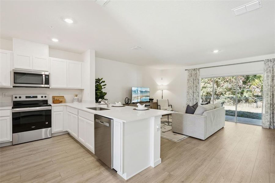 Furnished interior view inside a new home in Oak Pointe, Apopka (Image 8).
