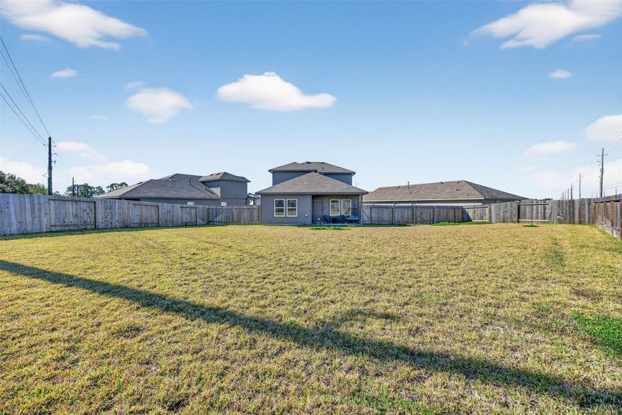 Exterior details and patio area of a home in , Houston (Image 4).