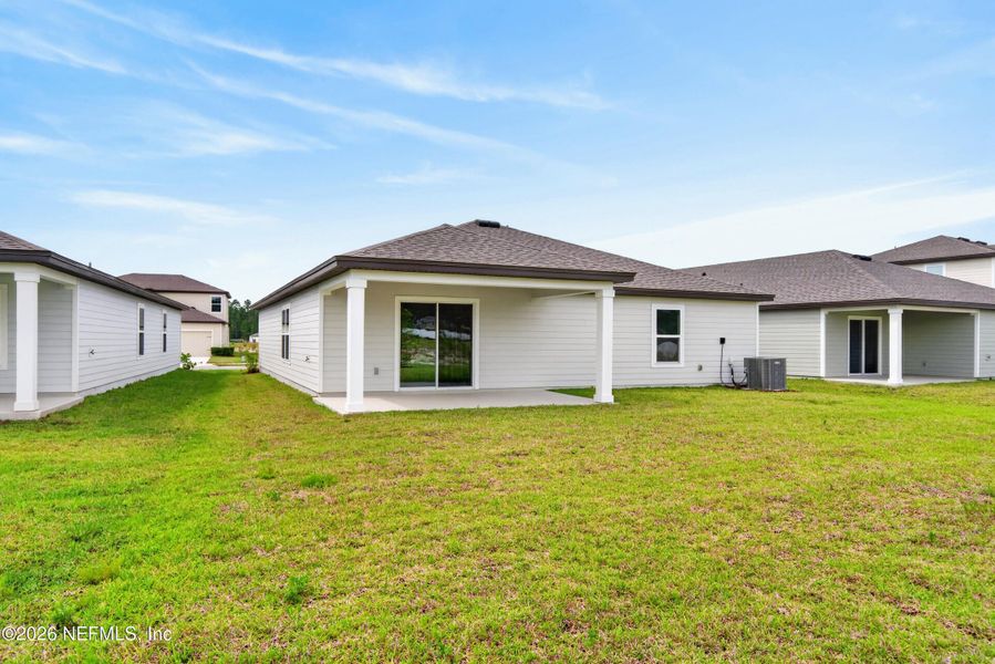 Exterior details and patio area of a home in Westport Landing, Jacksonville (Image 4).