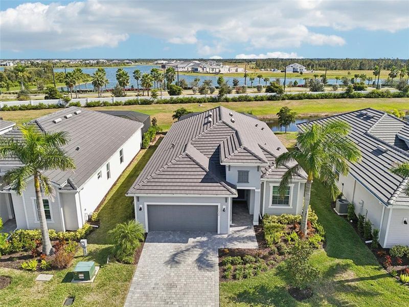 Front exterior of a new home in , Venice, FL, highlighting curb appeal (Image 27).
