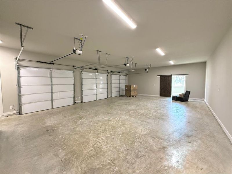 Garage with baseboards Garage with baseboards