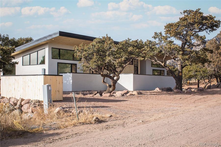 Front exterior of a new home in , Crestone, CO, highlighting curb appeal (Image 20).