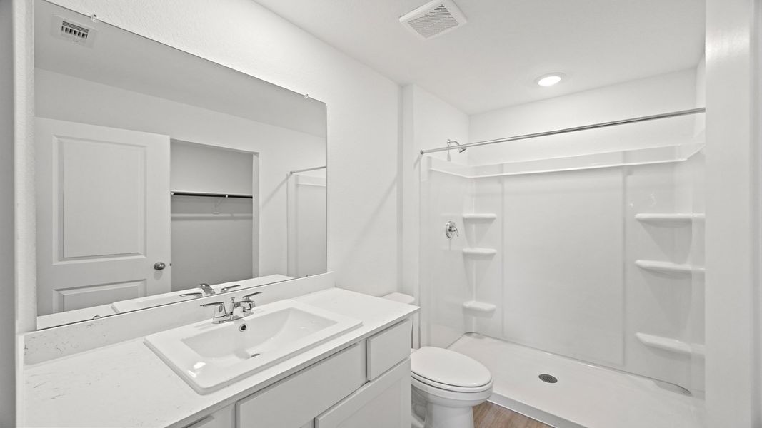 Furnished interior view inside a new home in Westward Pointe, Sealy (Image 7).