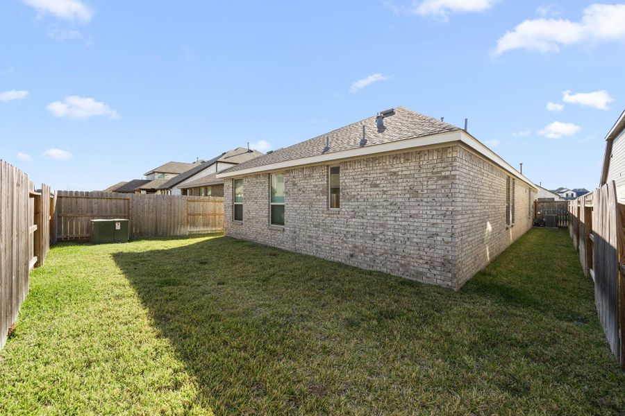 Exterior details and patio area of a home in Sunterra: Avante Collection, Katy (Image 3).