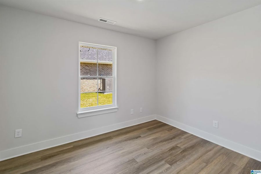 Representative unfurnished interior of a home built from the 1635-C by Adams Homes in Kirkland Farms, Alachua (Image 24).