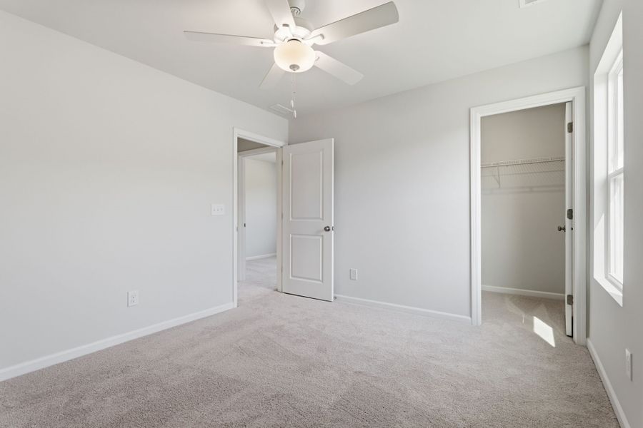 Spacious, unfurnished interior of a new home in Piper Creek, Newton (Image 31).