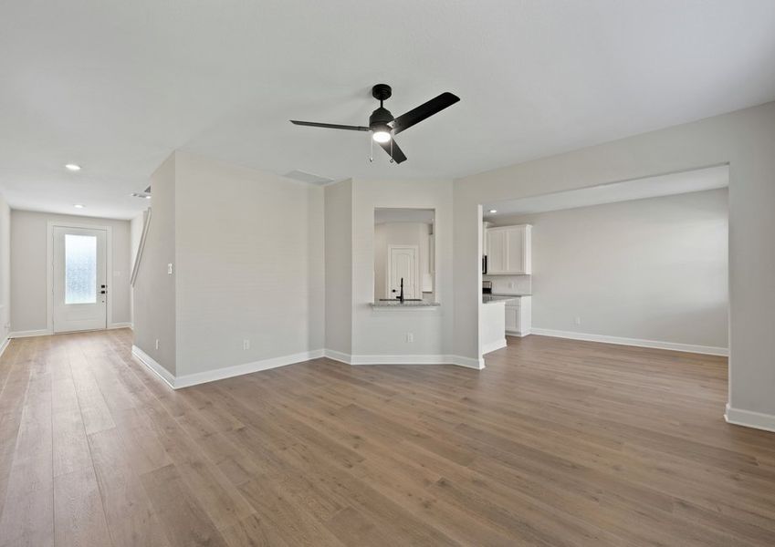 The open concept layout connects the kitchen, dining room and family room. The open concept layout connects the kitchen, dining room and family room.