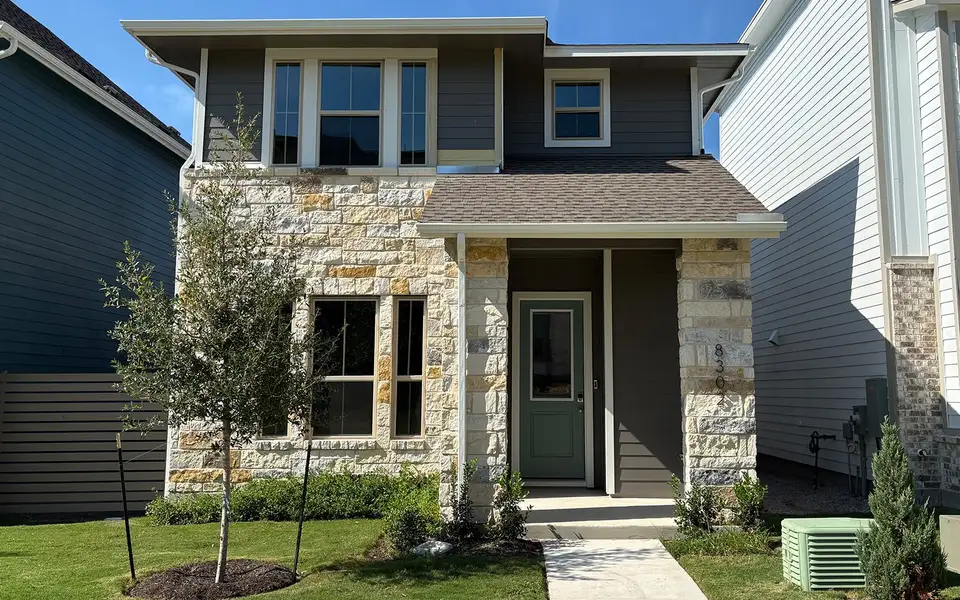 Exterior details and patio area of a home in Urban Homes at Easton Park, Austin (Image 1).