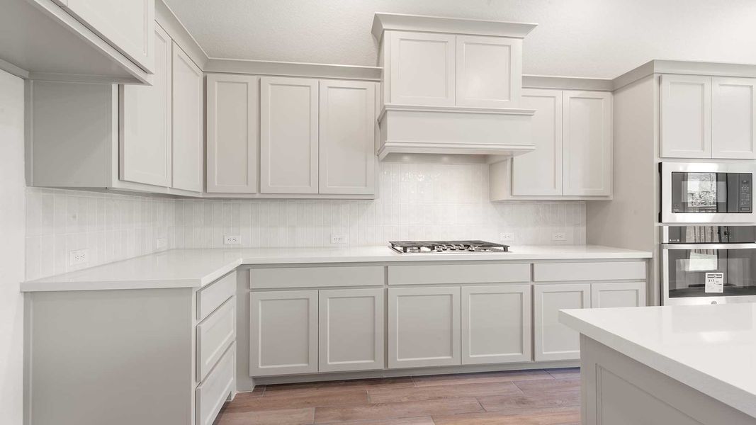 Representative furnished interior of a home built from the 2187W by Perry Homes in 6 Creeks 50', Kyle (Image 10).