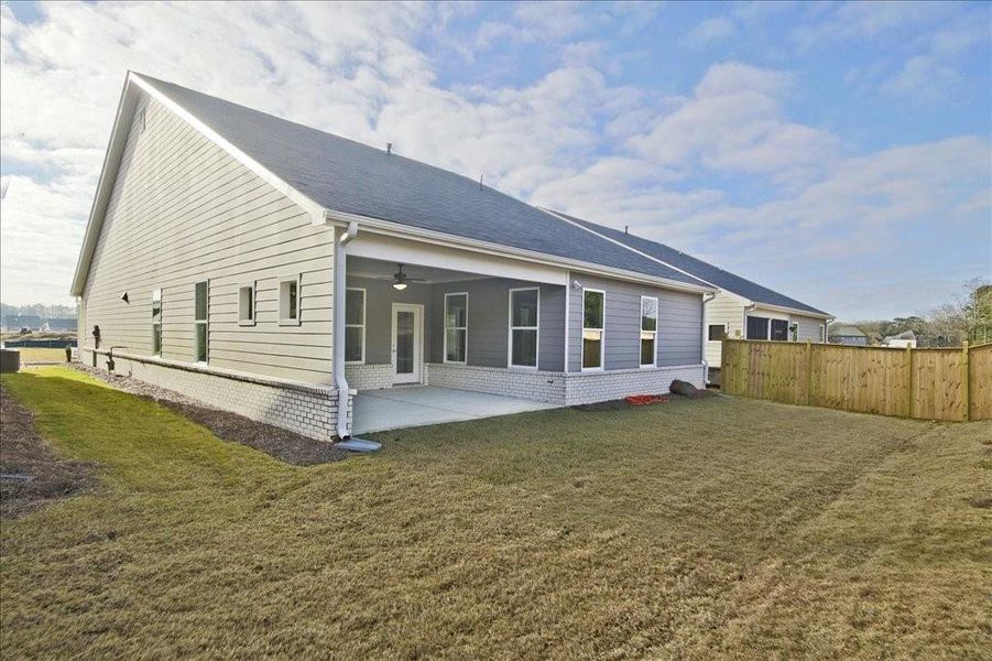 Exterior details and patio area of a home in Cooper's Walk, Loganville (Image 18).