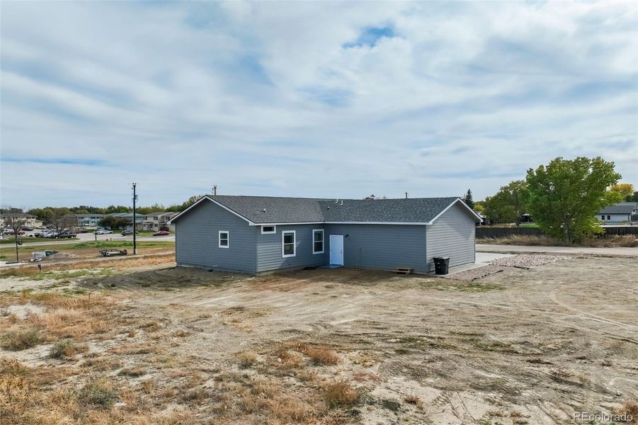 Front exterior of a new home in , Limon, CO, highlighting curb appeal (Image 27).