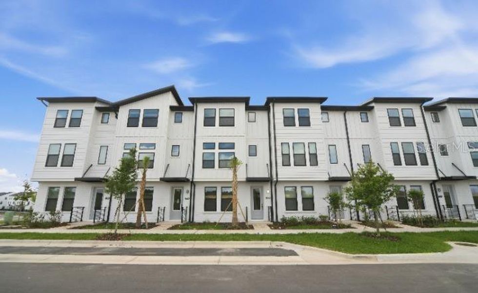 Condo located in Winter Garden, FL showcasing its design and architecture (Image 4). Condo located in Winter Garden, FL showcasing its design and architecture (Image 4).