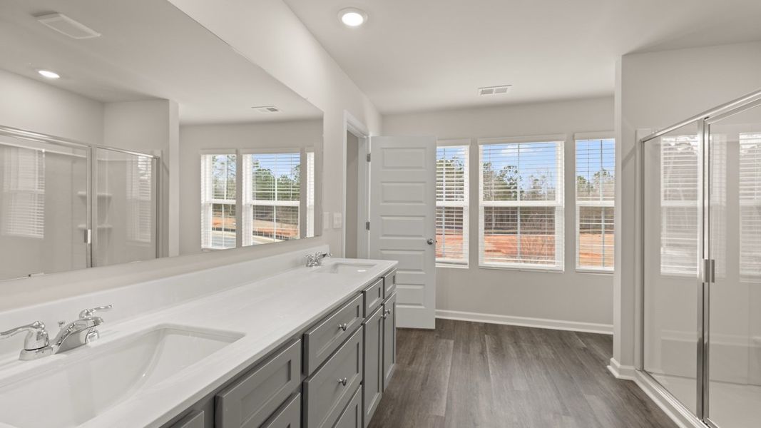 Representative furnished interior of a home built from the Ashmore by D.R. Horton in Brookland Commons, Monroe (Image 12).