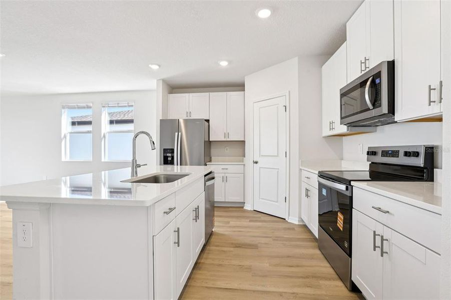 Furnished interior view inside a new home in Benton Hills - Classic Series, Brooksville (Image 16). Furnished interior view inside a new home in Benton Hills - Classic Series, Brooksville (Image 16).
