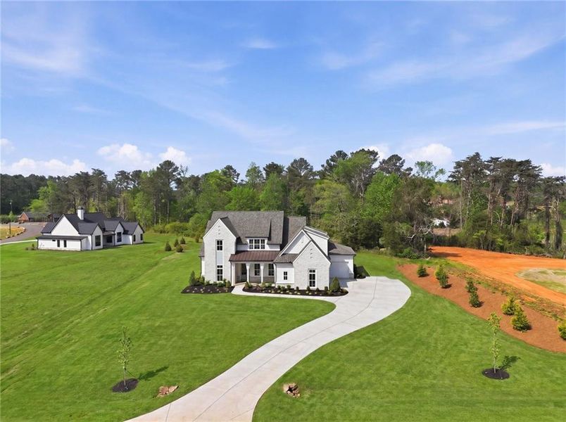 Front exterior of a new home in , Rydal, GA, highlighting curb appeal (Image 34).