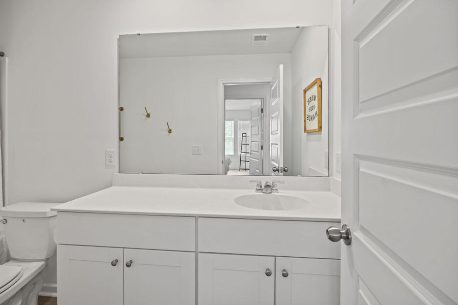 Furnished interior view inside a new home in , North Charleston (Image 17).