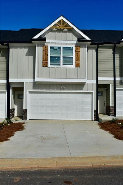 Front exterior of a new home in , Lula, GA, highlighting curb appeal (Image 1). Front exterior of a new home in , Lula, GA, highlighting curb appeal (Image 1).