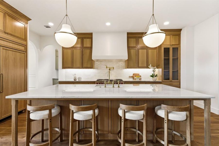 Designer grade kitchen oopen to the main living space