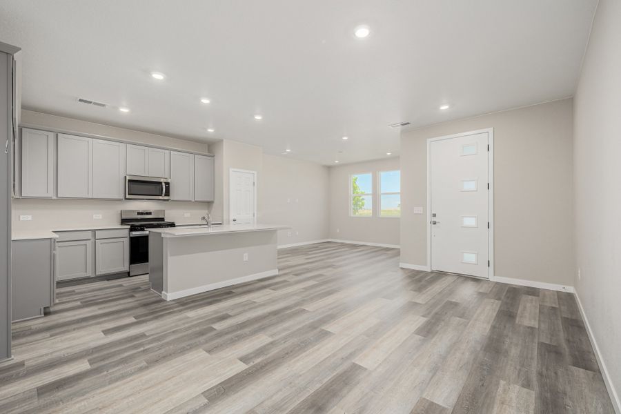 Furnished interior view inside a new home in Painted Prairie, Aurora (Image 6).