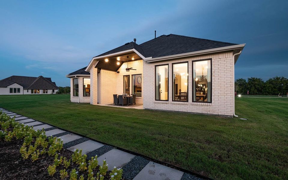 Exterior details and patio area of a home in Marvida, Cypress (Image 4).