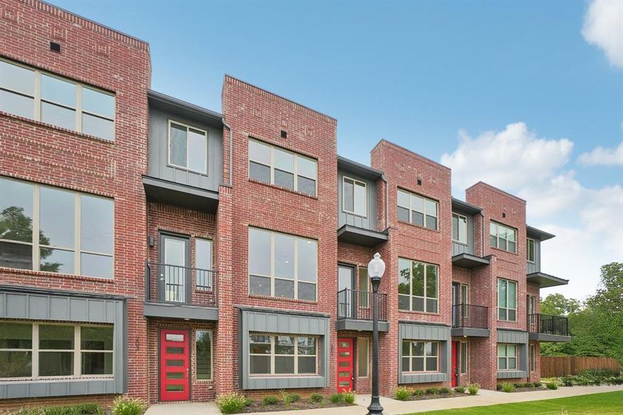 View of property with a residential view