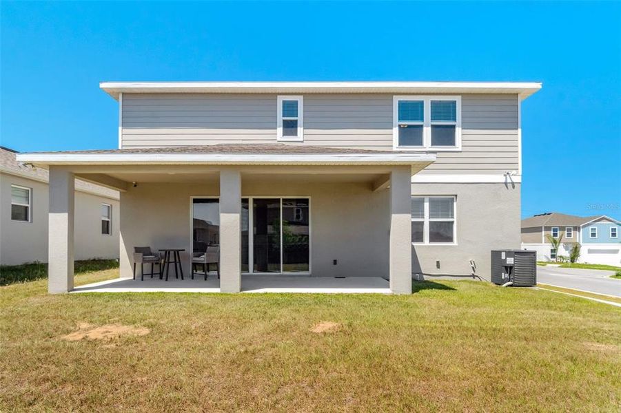 Front exterior of a new home in , Davenport, FL, highlighting curb appeal (Image 2). Front exterior of a new home in , Davenport, FL, highlighting curb appeal (Image 2).