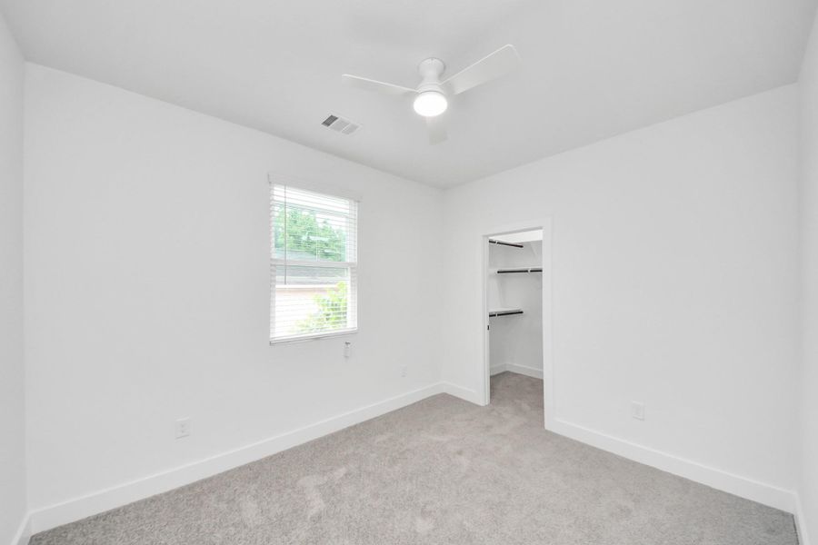 Comfortable third bedroom with abundant natural light. Comfortable third bedroom with abundant natural light.