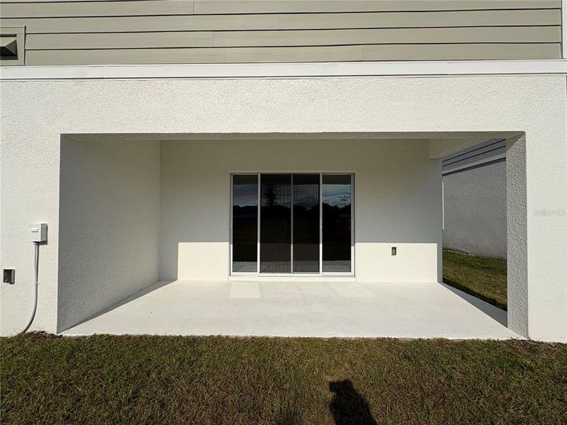 Exterior details and patio area of a home in Sky Lakes Towns, St. Cloud (Image 3).