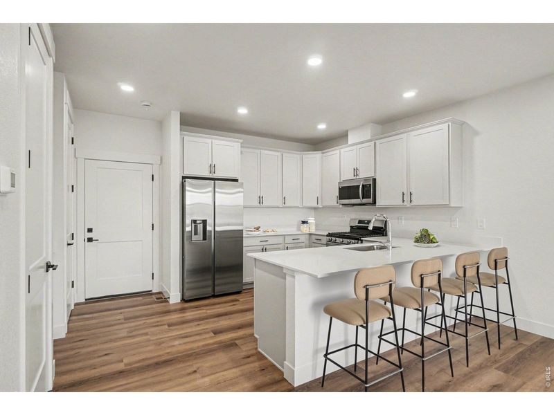 Furnished interior view inside a new home in Eagle Brook Meadows, Loveland (Image 14).
