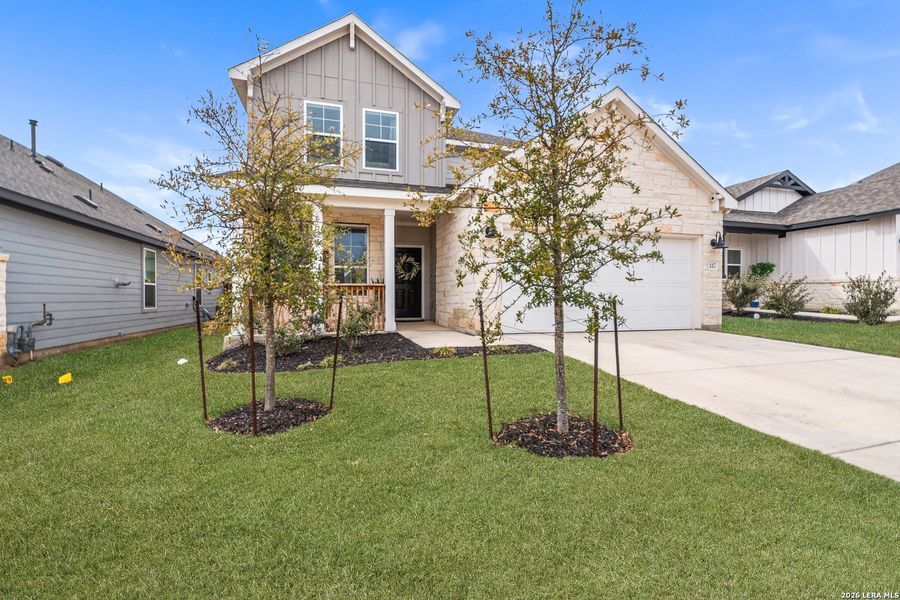 Front exterior of a new home in Corley Farms, Boerne, TX, highlighting curb appeal (Image 21).