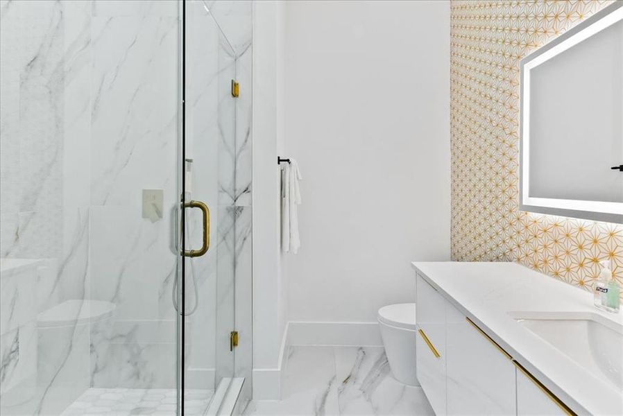 Sample of 2nd level fll baths with quartz vanity, and enclosed shower