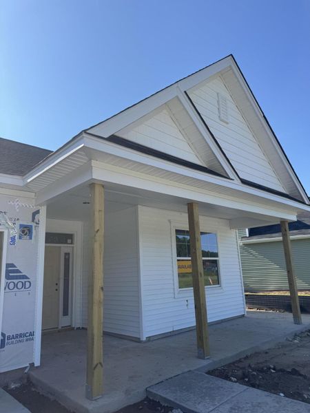 Front exterior of a new home in Oakley Pointe, Moncks Corner, SC, highlighting curb appeal (Image 10).