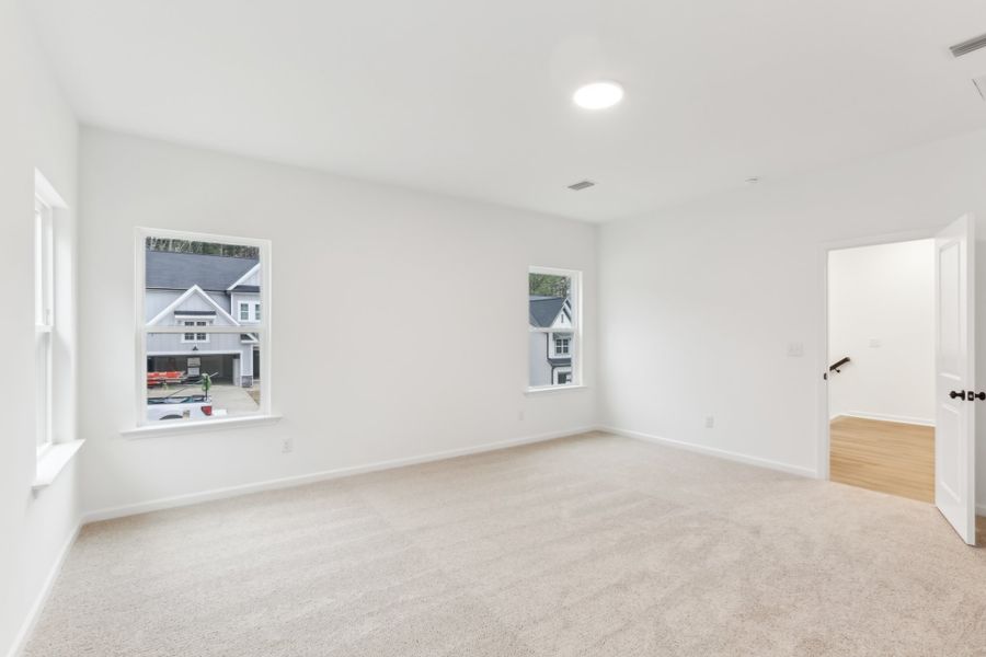 Representative unfurnished interior of a home built from the Alexis by Ashton Woods in Rowland's Grant, Fuquay Varina (Image 37).