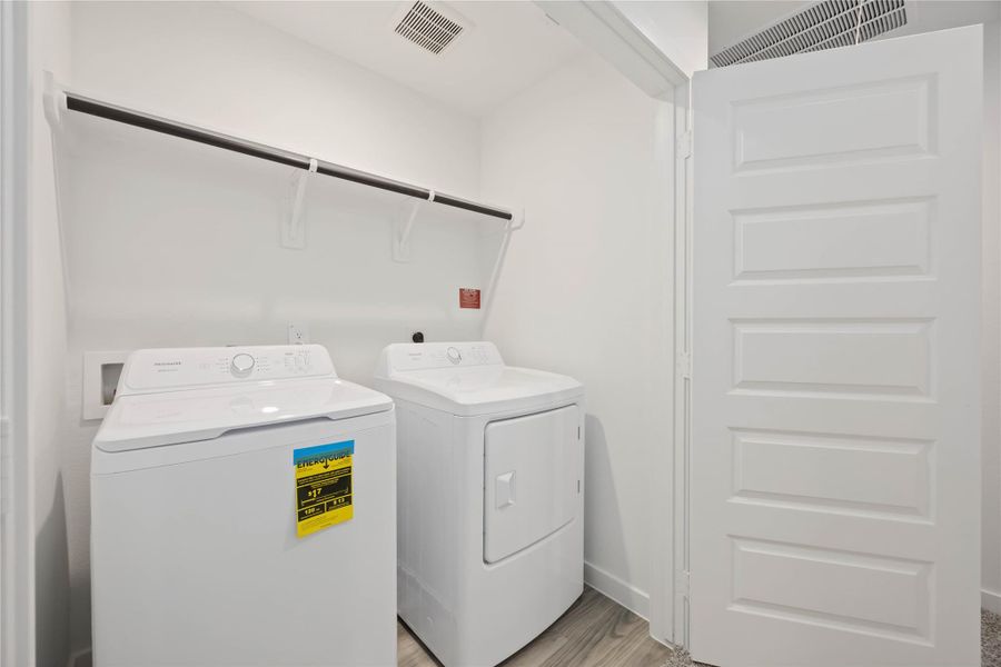 Furnished interior view inside a new home in Grand West, Houston (Image 8).