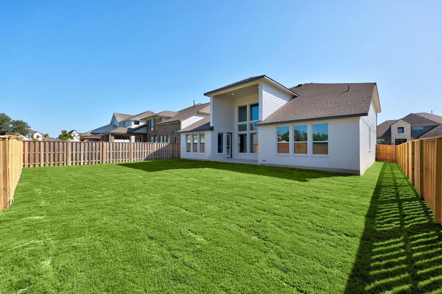 Exterior details and patio area of a home in Parmer Ranch - 60', Georgetown (Image 3).