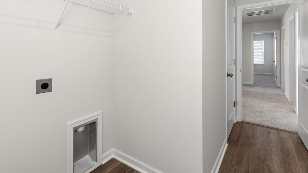 Representative unfurnished interior of a home built from the TILLMAN by D.R. Horton in Surfside Landing, Hubert (Image 44).