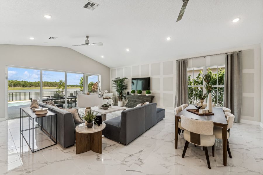 Great room and dining area with vaulted ceiling