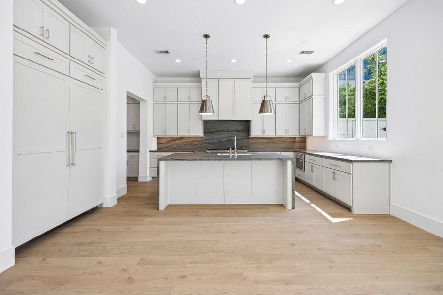 Step into luxury with the spacious Arundel floorplan, offering 4-5 bedrooms, 4.5 bathrooms, and approximately 4,243 square feet of living space. This residence is conveniently situated near the community dog park, combining luxury living with easy access to outdoor amenities.