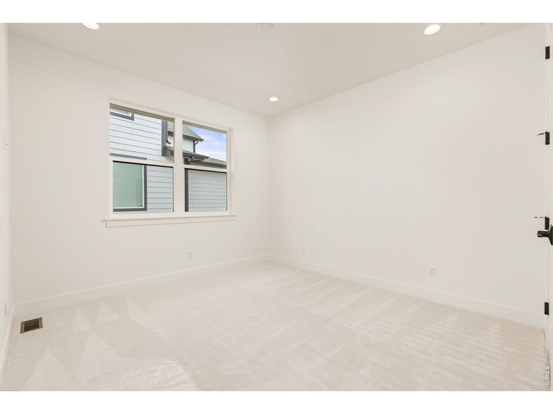 Spacious, unfurnished interior of a new home in RainDance, Windsor (Image 41).