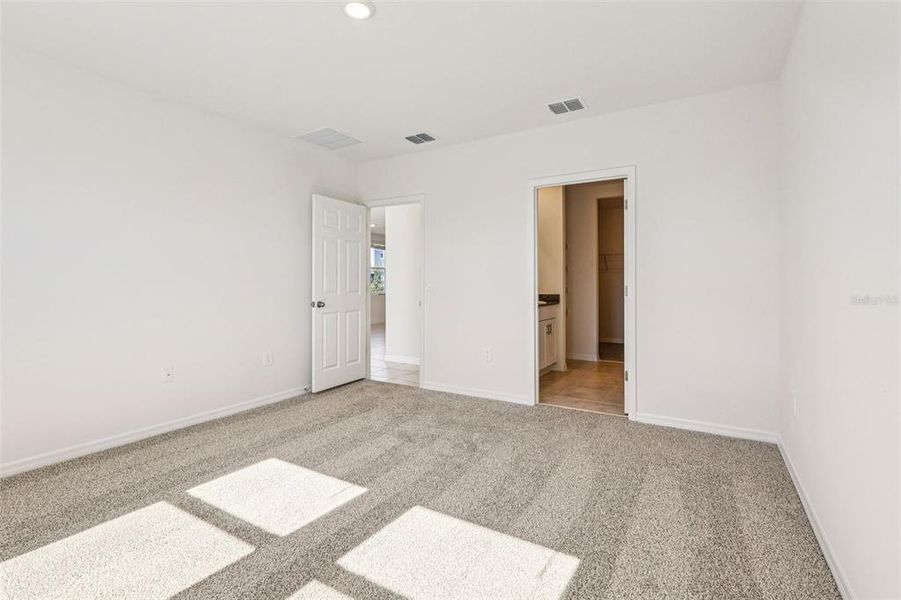 Spacious, unfurnished interior of a new home in Lake Deer Estates - Classic Series, Poinciana (Image 28).