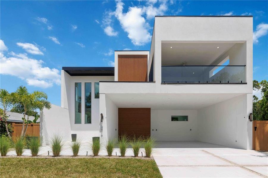 Front exterior of a new home in , Sarasota, FL, highlighting curb appeal (Image 29).