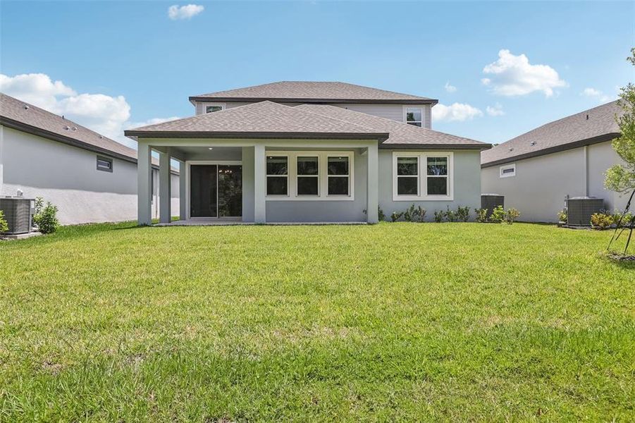 Exterior details and patio area of a home in Legends Preserve - Signature Series, Daytona Beach (Image 27).