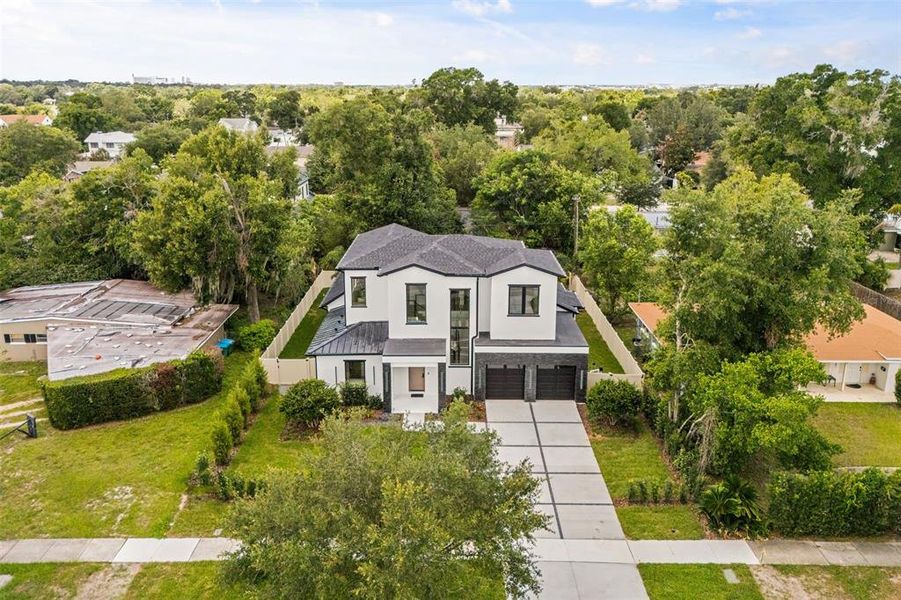 Front exterior of a new home in , Winter Park, FL, highlighting curb appeal (Image 23).