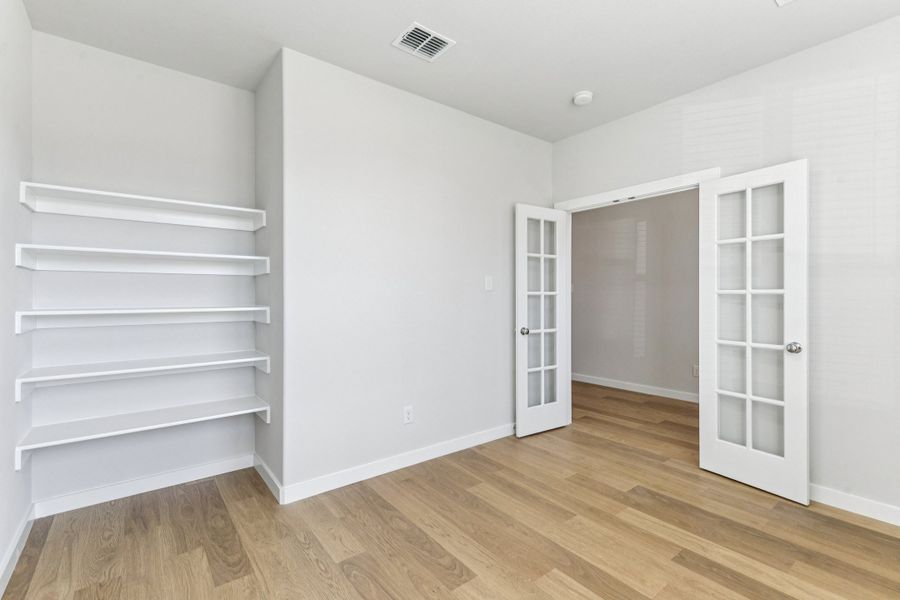 Home Office in the Wimbledon home plan by Trophy Signature Homes – REPRESENTATIVE PHOTO Home Office in the Wimbledon home plan by Trophy Signature Homes – REPRESENTATIVE PHOTO