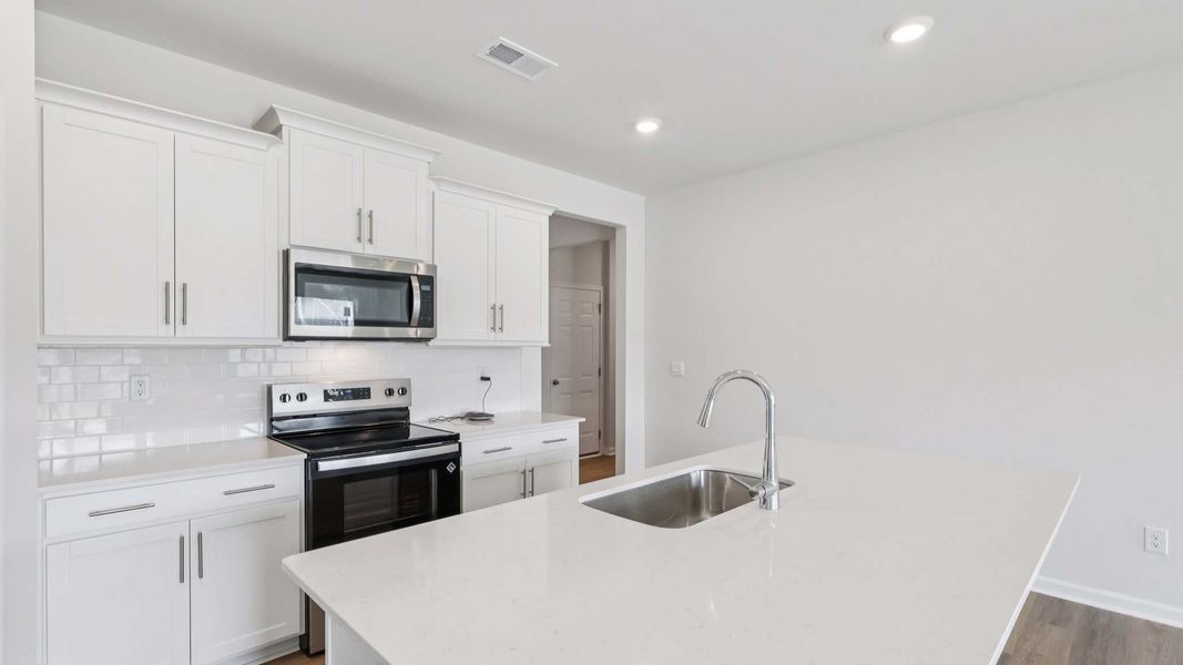 Representative furnished interior of a home built from the Cali by D.R. Horton in Granite Falls, Lancaster (Image 6).