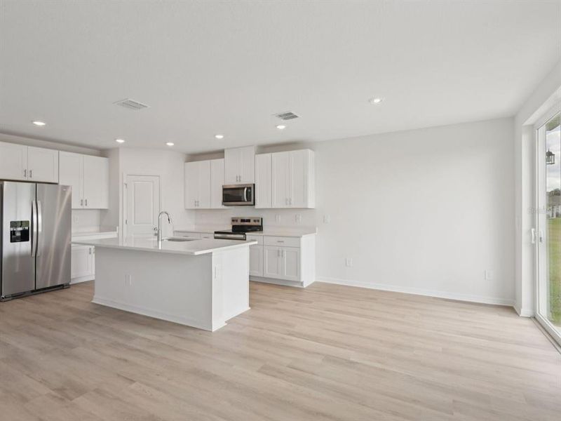 Furnished interior view inside a new home in Salt Meadows - Classic Series, Parrish (Image 9).