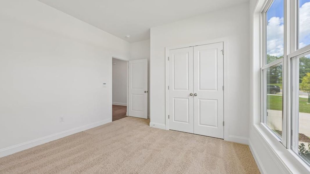 Representative unfurnished interior of a home built from the Sophie by D.R. Horton in The Manors at Haywood Glen, Knightdale (Image 27). Representative unfurnished interior of a home built from the Sophie by D.R. Horton in The Manors at Haywood Glen, Knightdale (Image 27).